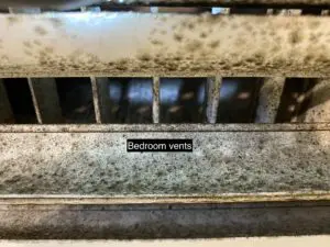 A dirty bedroom vent with the words " bedroom vents ".
