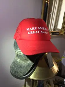 A red hat with the words " make america great again ".