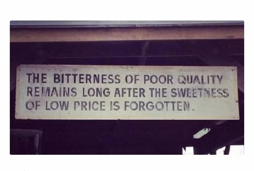 A sign that says the bitterness of poor quality remains long after the sweetness of low price is forgotten.