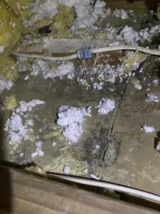 A room with many pieces of electrical wire and insulation.