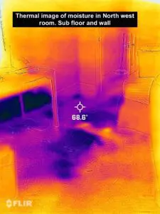 A room with an infrared camera showing the heat from the floor.